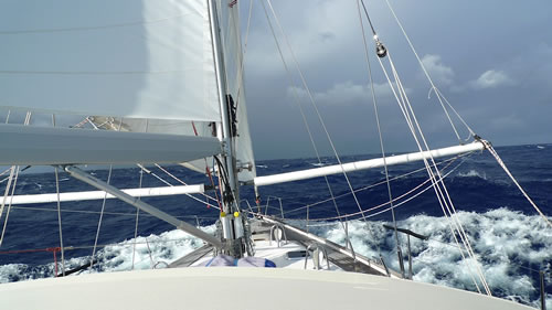 Reefed jibs & mainsail 35 kts wind 1000 miles east of Antigua